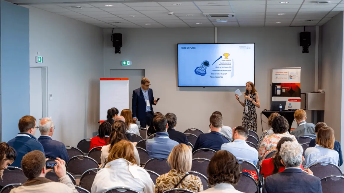 Persons attending a conference.